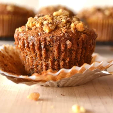 Freshly baked Banana Nut Muffins on a cooling rack
