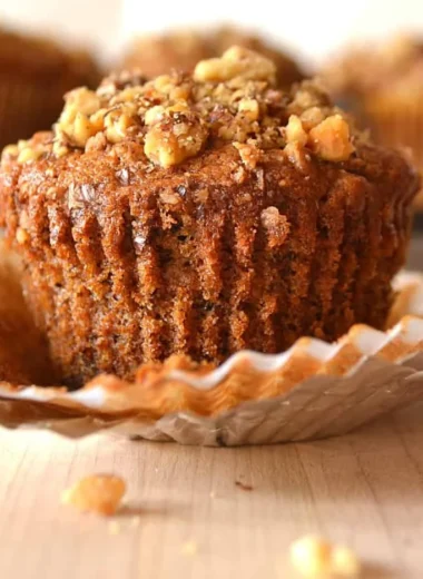Freshly baked Banana Nut Muffins on a cooling rack