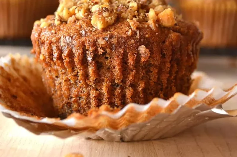 Freshly baked Banana Nut Muffins on a cooling rack