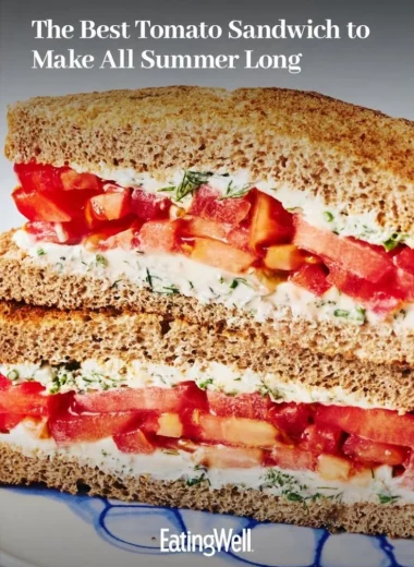 Delicious Classic Tomato Sandwich with fresh ingredients on a wooden plate