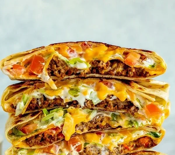 Homemade Copycat Crunchwrap Supreme with layers of delicious ingredients