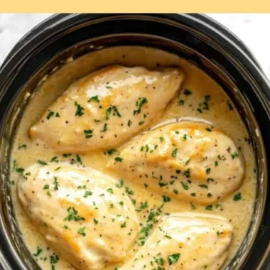 Crockpot Creamy Garlic Parmesan Chicken dish served with herbs
