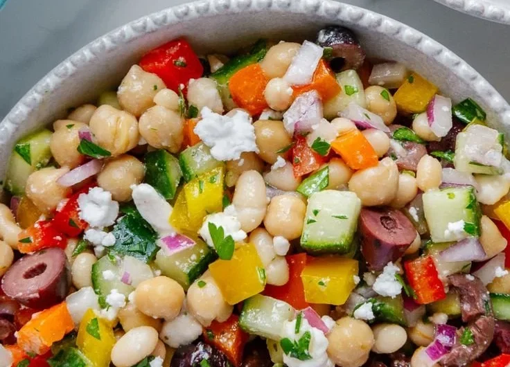 Healthy Dense Bean Salad with colorful beans and fresh vegetables