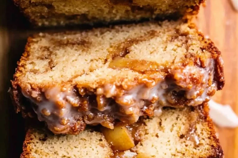 Amish apple fritter bread with apples and cinnamon on a wooden table