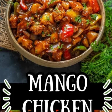 Delicious Asian Mango Chicken dish garnished with fresh herbs