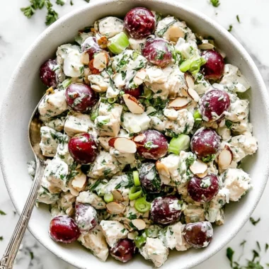 Delicious bowl of best chicken salad with fresh vegetables and dressing
