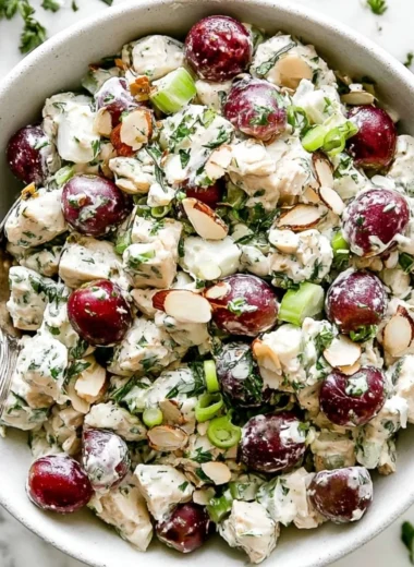 Delicious bowl of best chicken salad with fresh vegetables and dressing