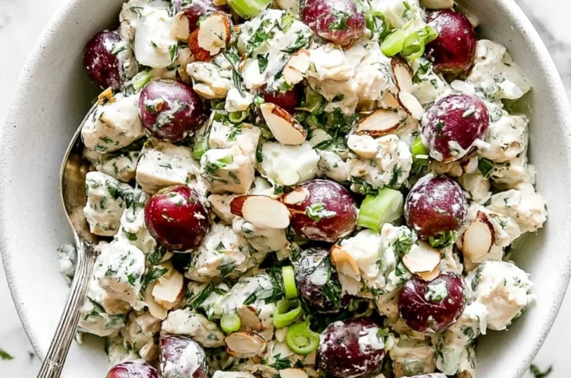 Delicious bowl of best chicken salad with fresh vegetables and dressing