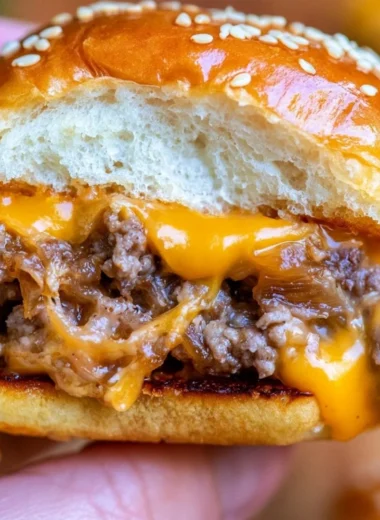 Delicious cheeseburger sliders served with toppings and condiments