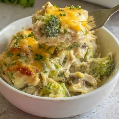 Cheesy Turkey Broccoli Casserole topped with melted cheese and fresh broccoli