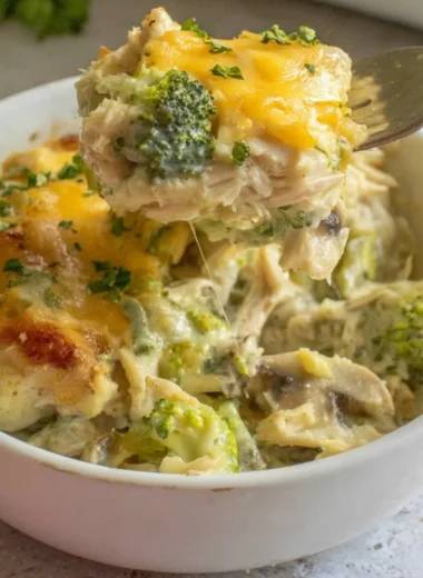 Cheesy Turkey Broccoli Casserole topped with melted cheese and fresh broccoli