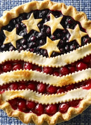 Freshly baked Cherry Blueberry Pie with a golden crust and colorful fruit filling
