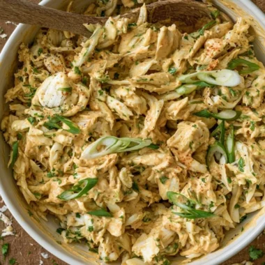 Chesapeake crab salad served in a bowl with fresh ingredients.