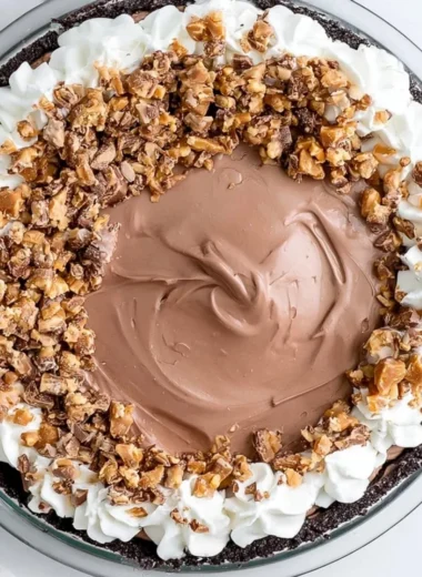 Chocolate Heath Pie with chocolate and toffee layers on a pie crust
