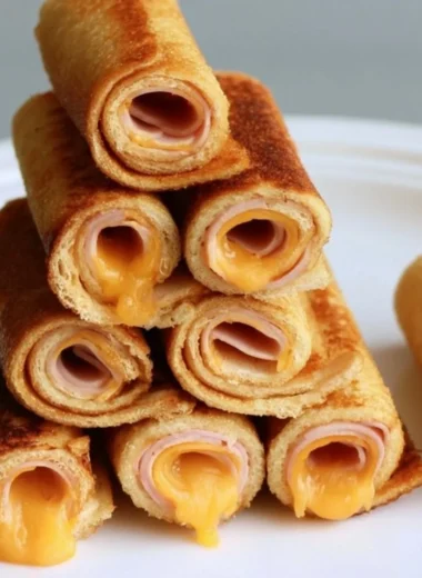 Delicious grilled cheese roll-ups served on a plate