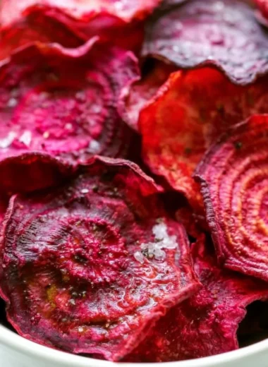 Healthy baked beet chips served in a bowl