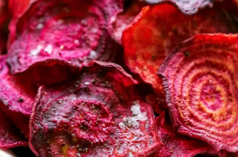 Healthy baked beet chips served in a bowl