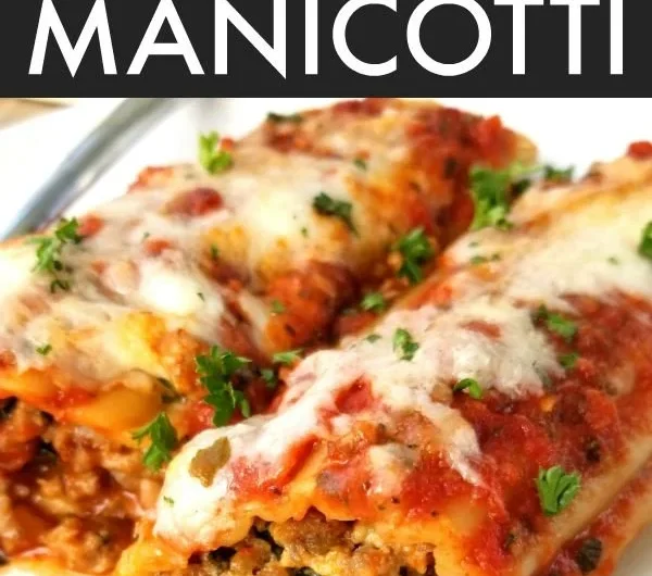 Delicious baked manicotti stuffed with Italian sausage and cheese
