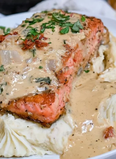 Delicious Marry Me Salmon dish garnished and ready to serve.