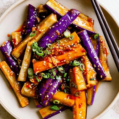 Spicy Eggplant Stir Fry with colorful veggies and spices in a pan
