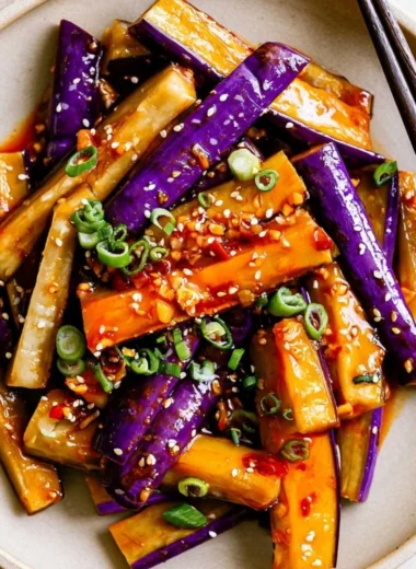 Spicy Eggplant Stir Fry with colorful veggies and spices in a pan