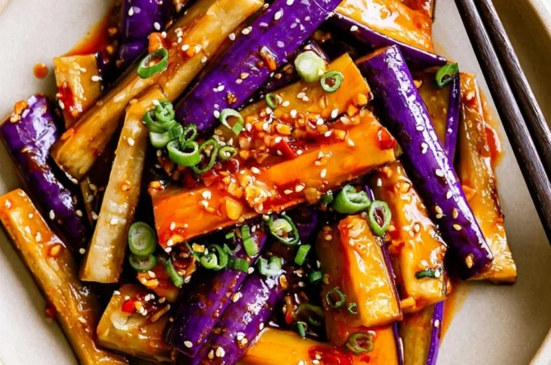 Spicy Eggplant Stir Fry with colorful veggies and spices in a pan