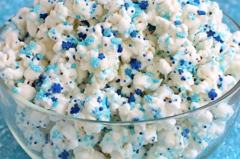 Delicious Winter Wonderland White Chocolate Popcorn in a festive bowl