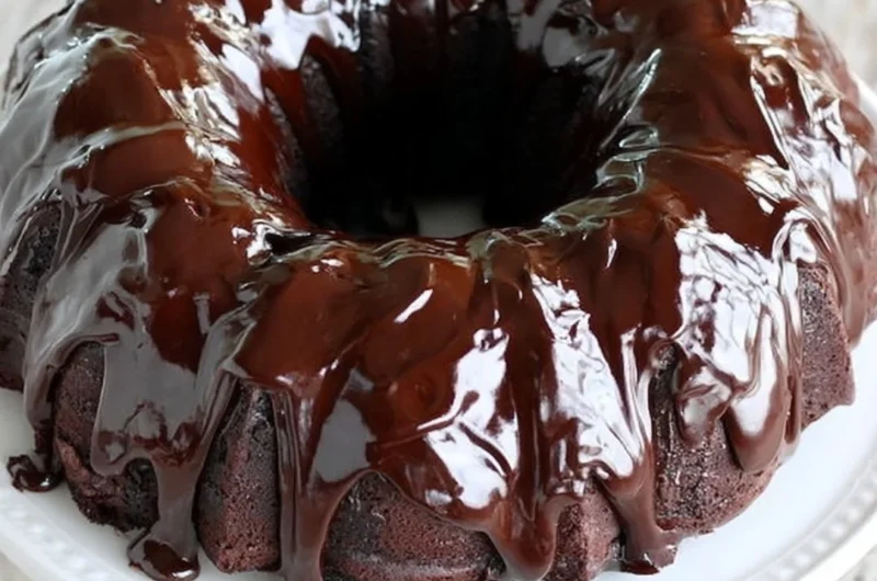 Cozy chocolate sour cream pound cake garnished with chocolate shavings