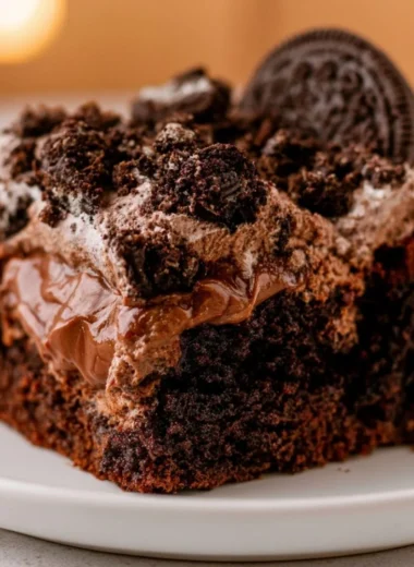 Delicious dirt cake served in a charming setting with chocolate and gummy worms.