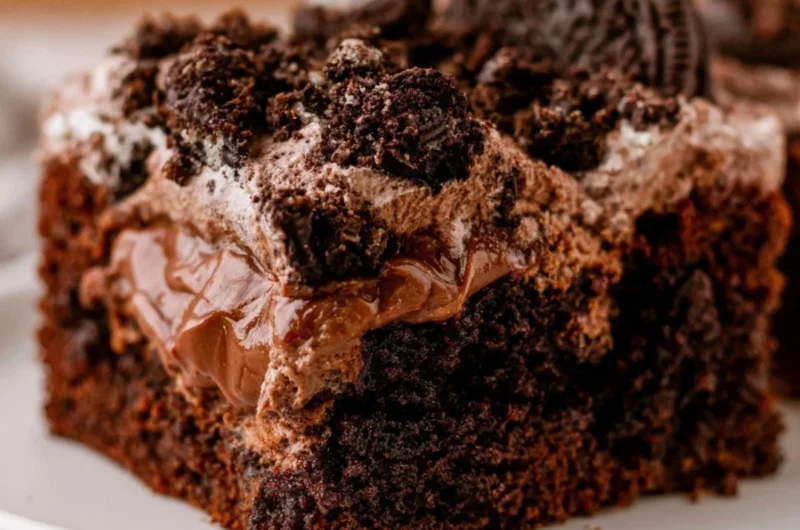 Delicious dirt cake served in a charming setting with chocolate and gummy worms.