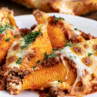 Baked stuffed shells filled with cheese and topped with marinara sauce