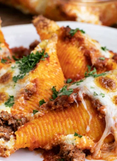 Baked stuffed shells filled with cheese and topped with marinara sauce