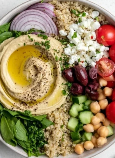 Cozy Mediterranean Hummus Bowl with fresh vegetables and toppings