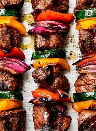 Delicious cozy steak kabobs on skewers ready for grilling.