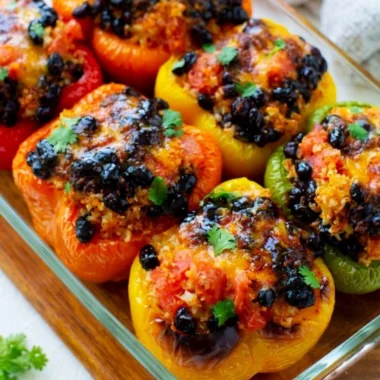 Colorful easy vegetarian stuffed peppers filled with rice and vegetables