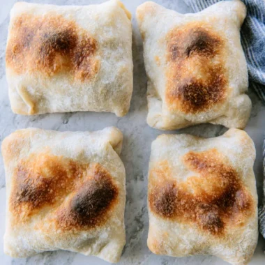 Freshly baked sourdough ciabatta bread with a golden crust and airy texture
