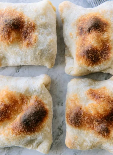 Freshly baked sourdough ciabatta bread with a golden crust and airy texture