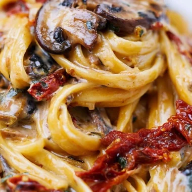 Delicious sun-dried tomato mushroom pasta served in a cozy bowl